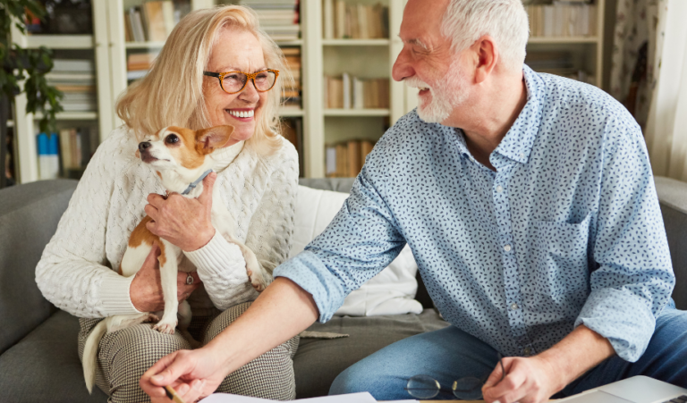 Happy Senior Couple Talking about Retirement Savings